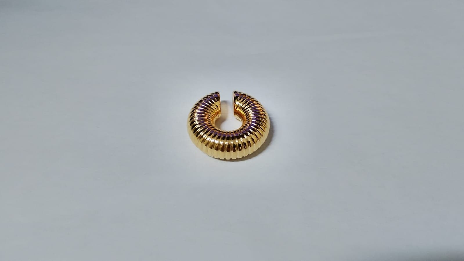 Piercing Dourado