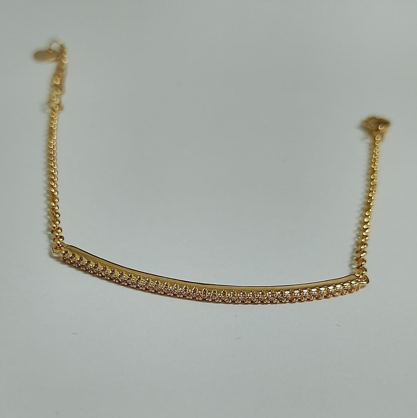 Pulseira Dourada Arco Cravejado